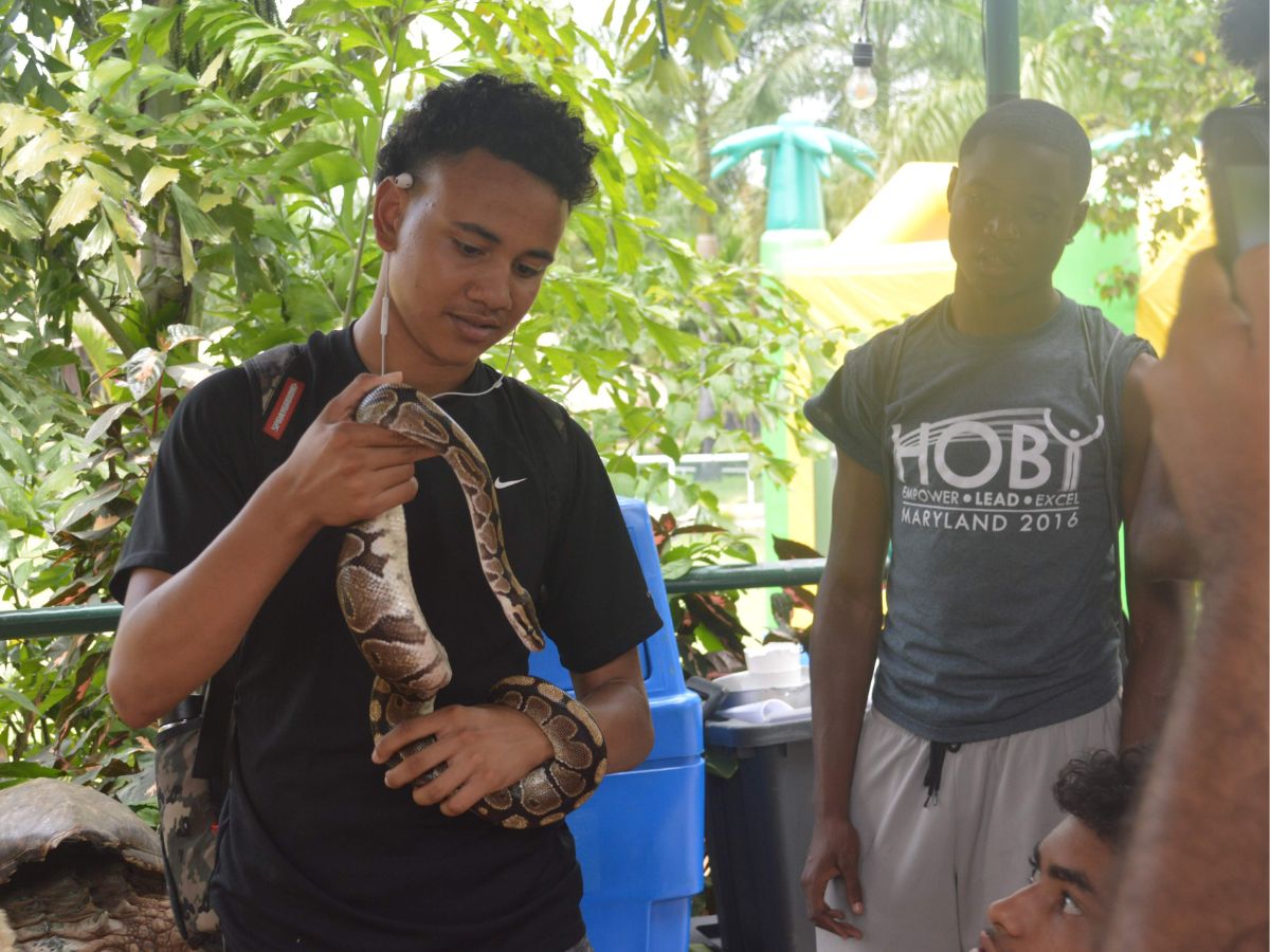 volunteer with a snake 2
